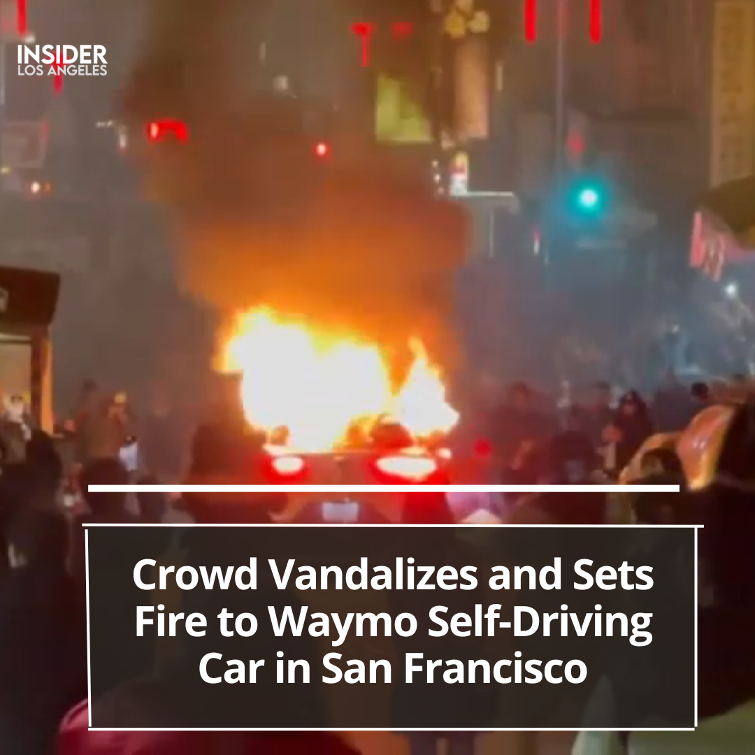 crowd vandalised and set fire to a Waymo self-driving car in San Francisco, escalating the situation significantly.
